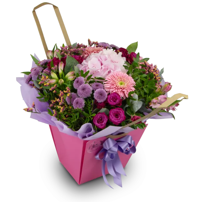 Bouquet of hydrangeas and germini in water packaging